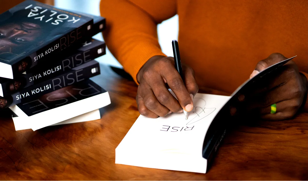 BOS x Siya Kolisi BOS marketing x Siya Kolisi studio shoot featuring signed book prizes
