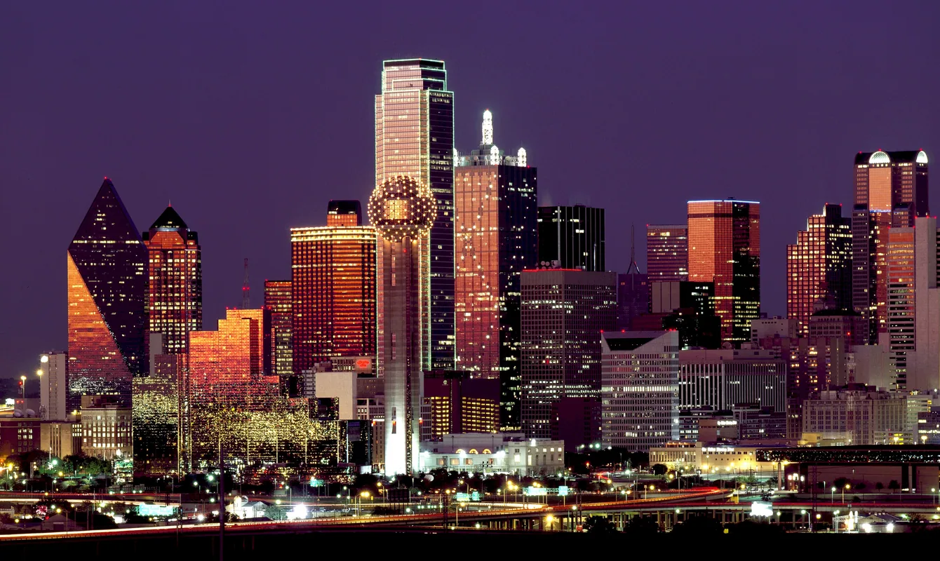 Dallas skyline at night, home turf for our Dallas branding agency team