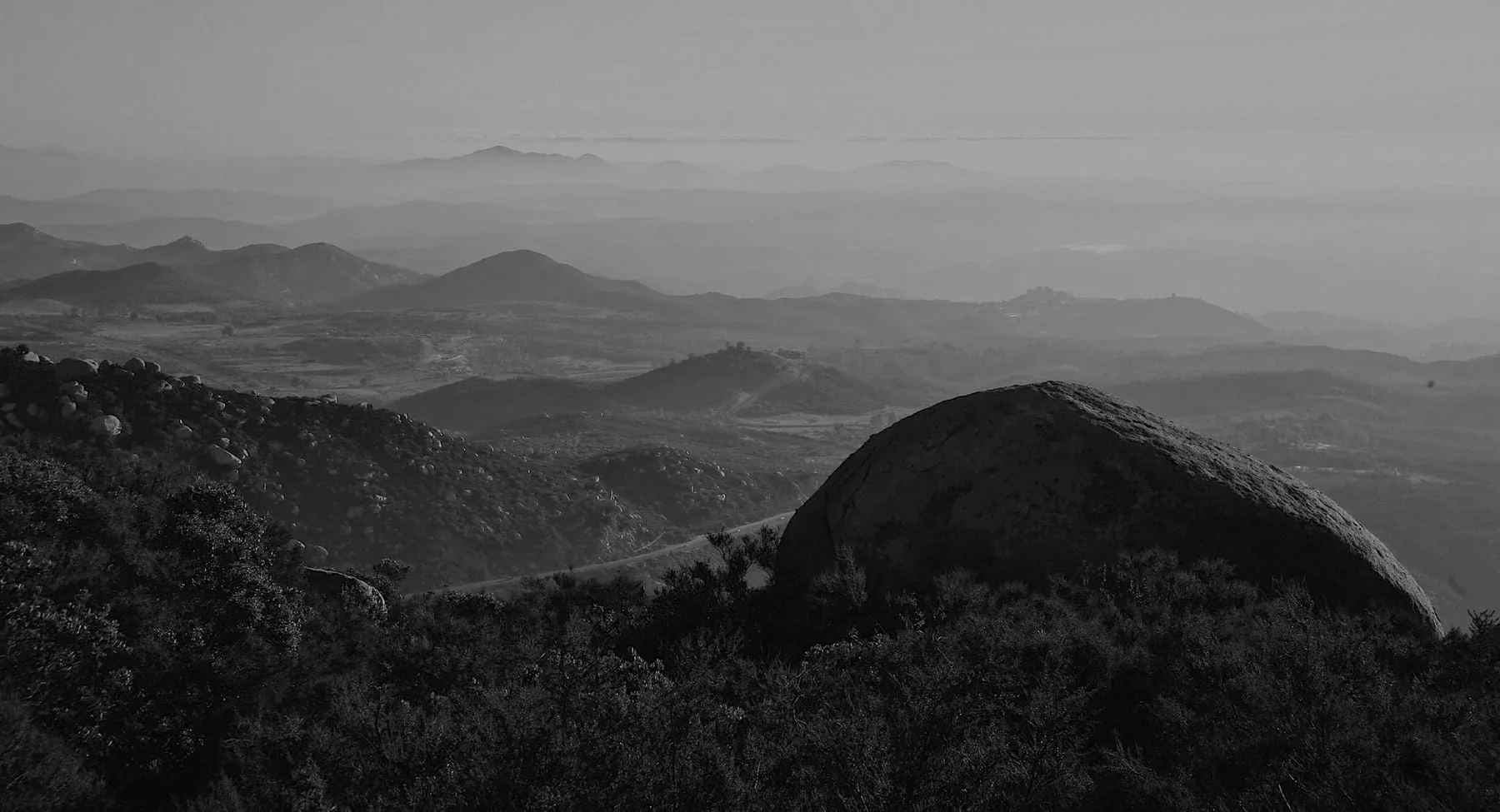 Black and white mountain range at sunrise, MAGNETIC branding agency careers