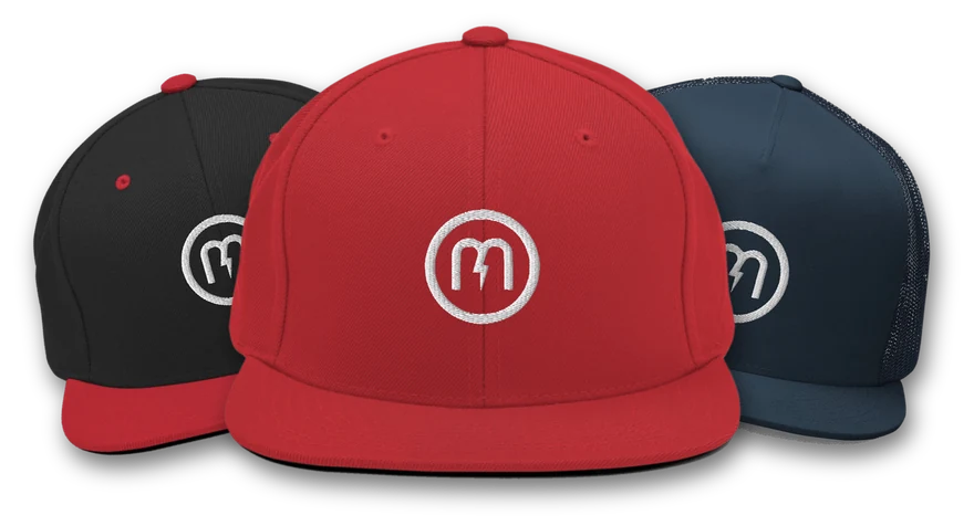 MAG Merch snapback and trucker hats in red, black and red, and navy from MAGNETIC Supply Co.